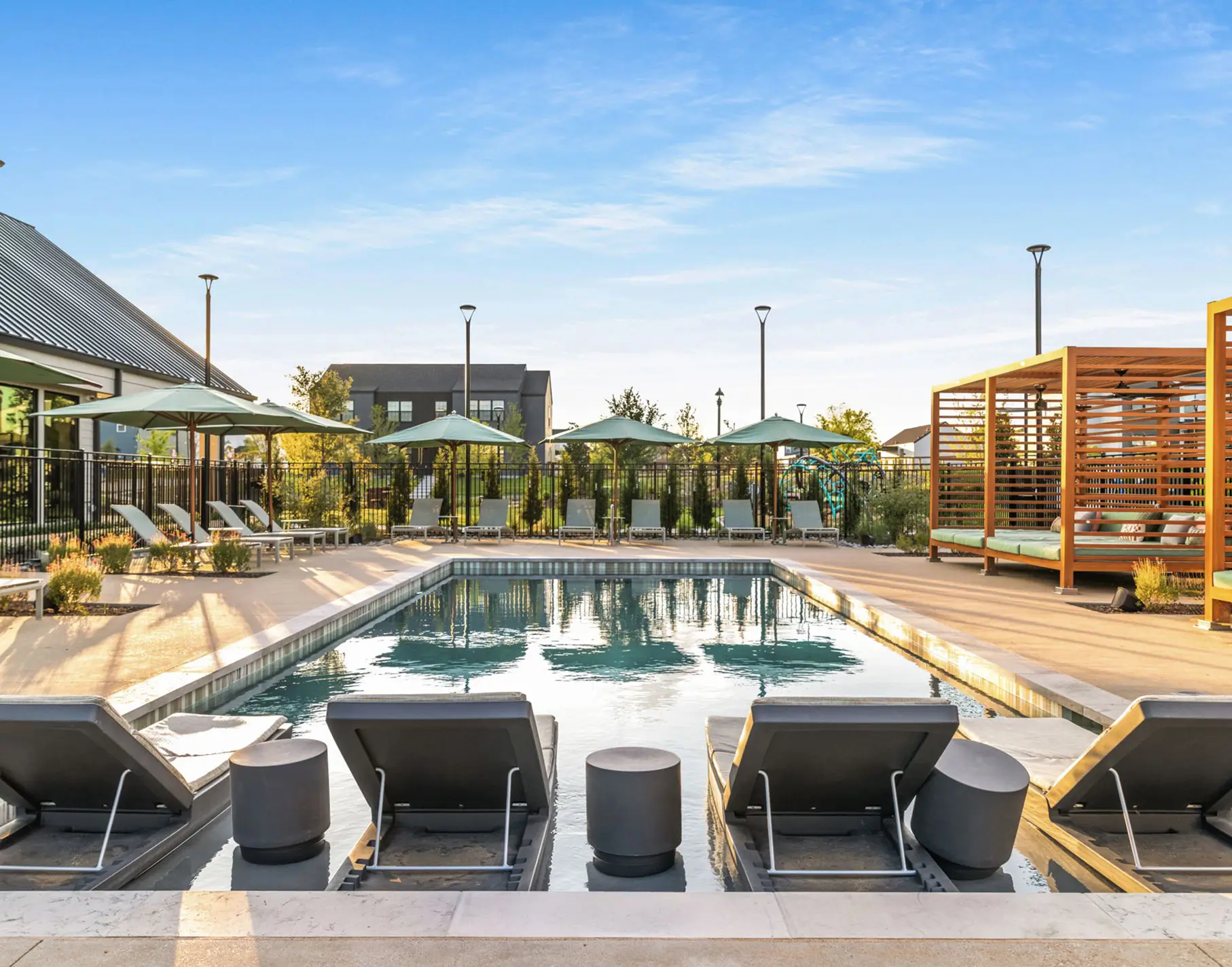 Outdoor pool with lounge seating